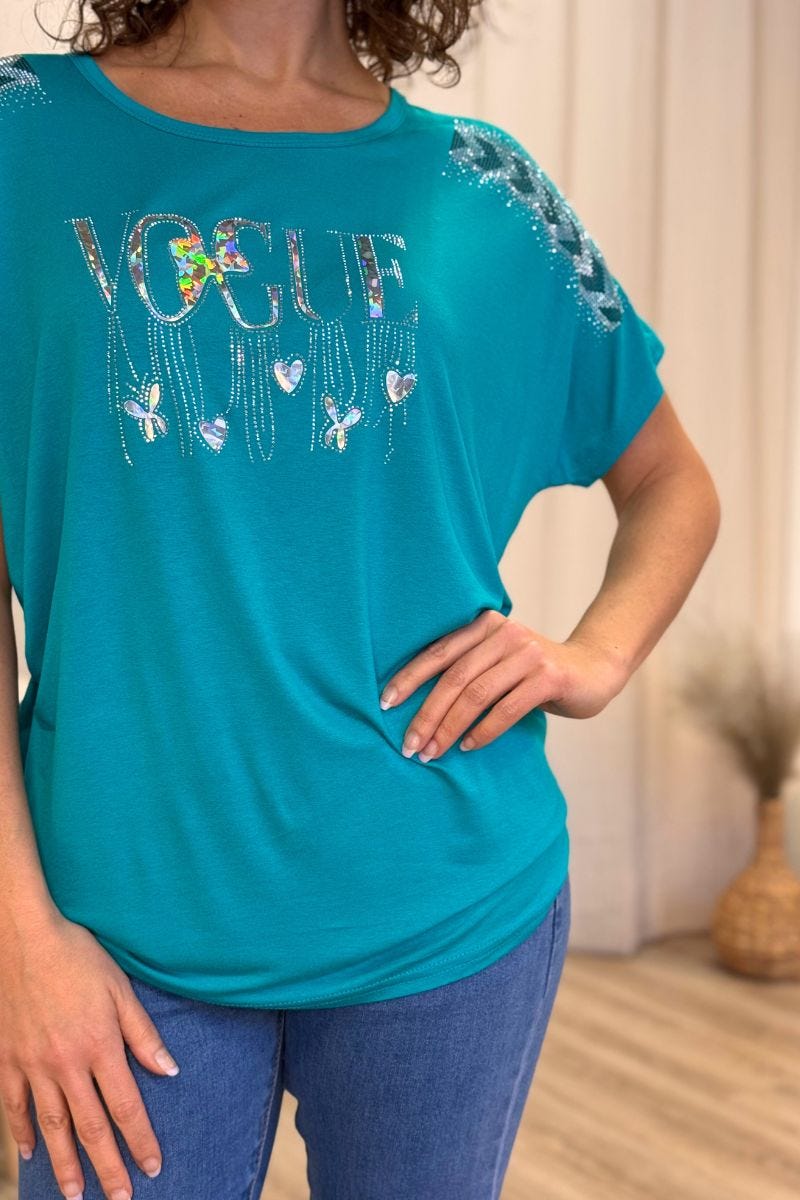 T-shirt med glittrande stenar och text Aqua