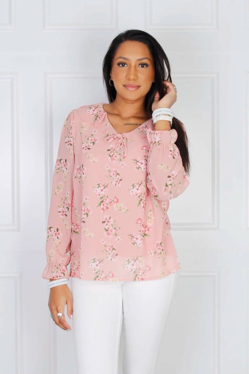 Blus med volangkrage, Rosa blommor