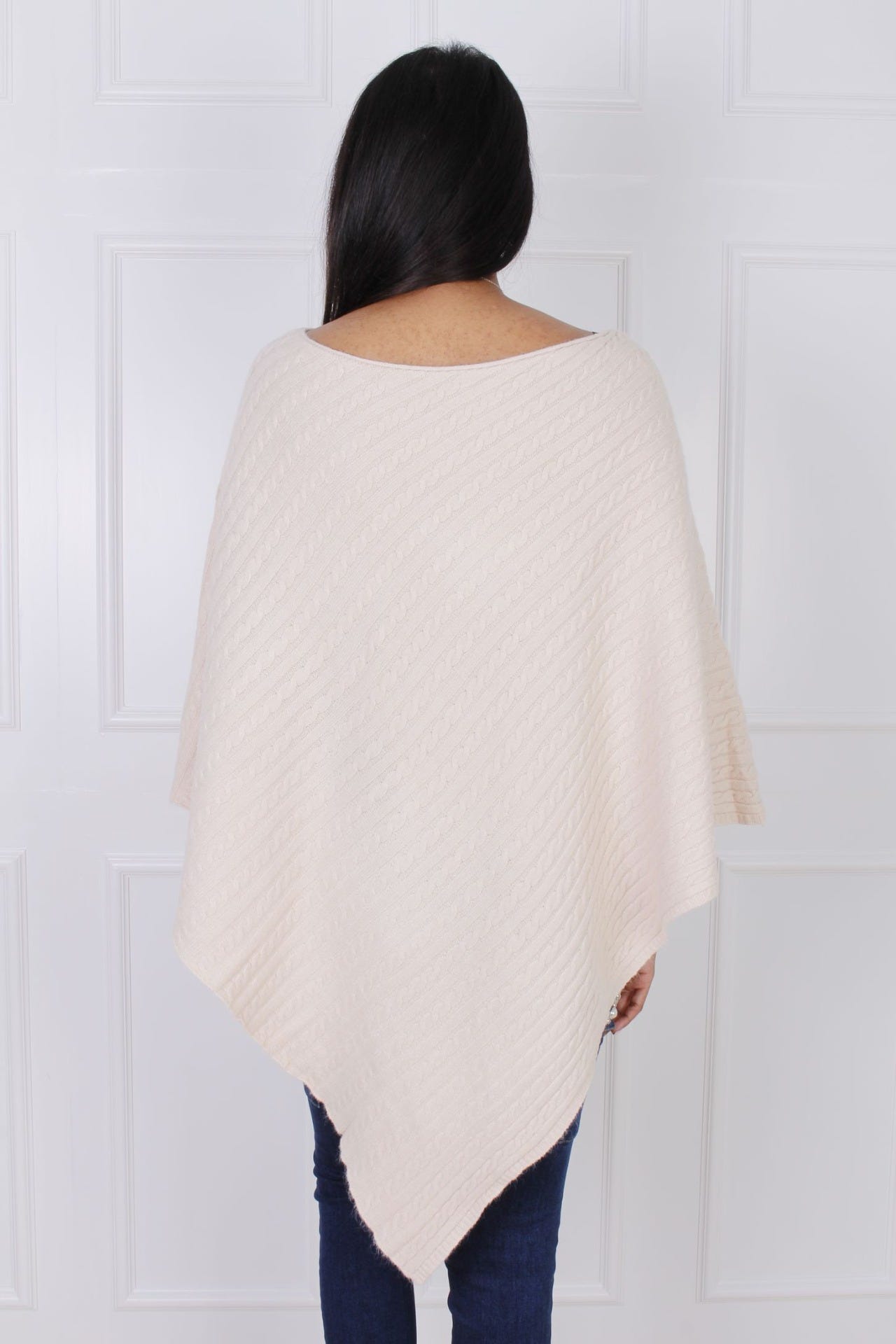 Stickad poncho, Beige